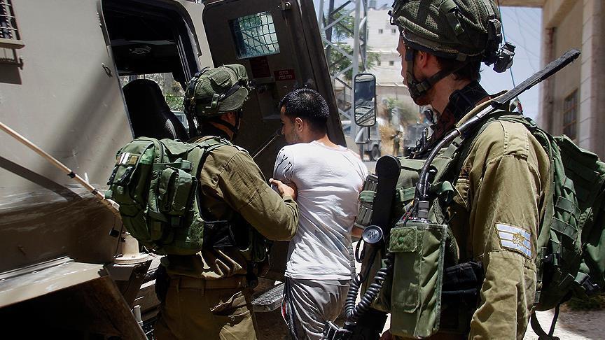 إسرائيل تعتقل 11 فلسطينيا في الضفة الغربية